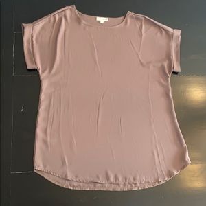 Beige shell with cuffed sleeves